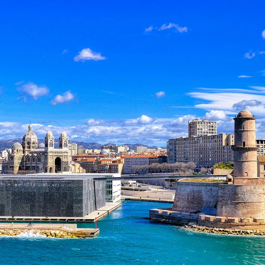 Elegant coastal town with palm trees and Mediterranean architecture