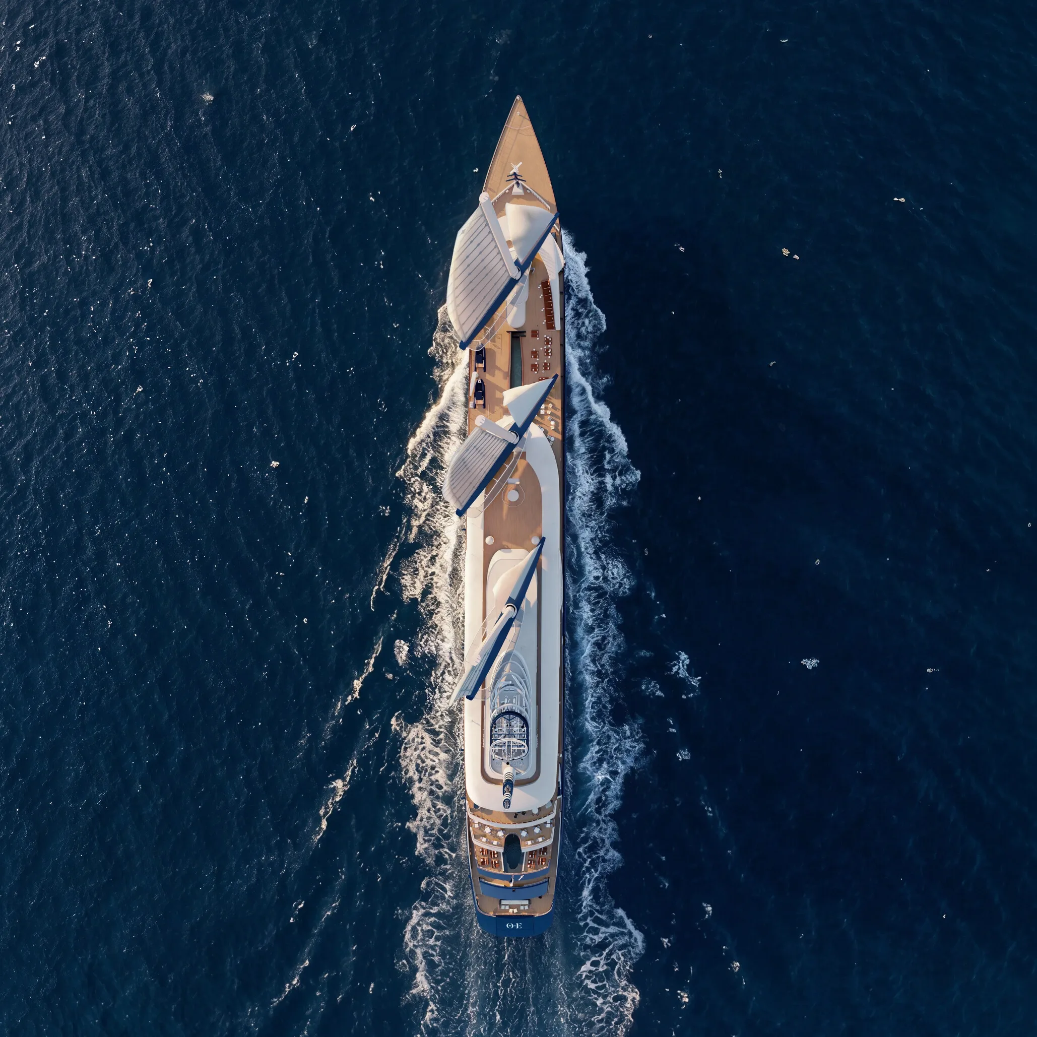 Aerial view of a sailing yacht with 3 sails