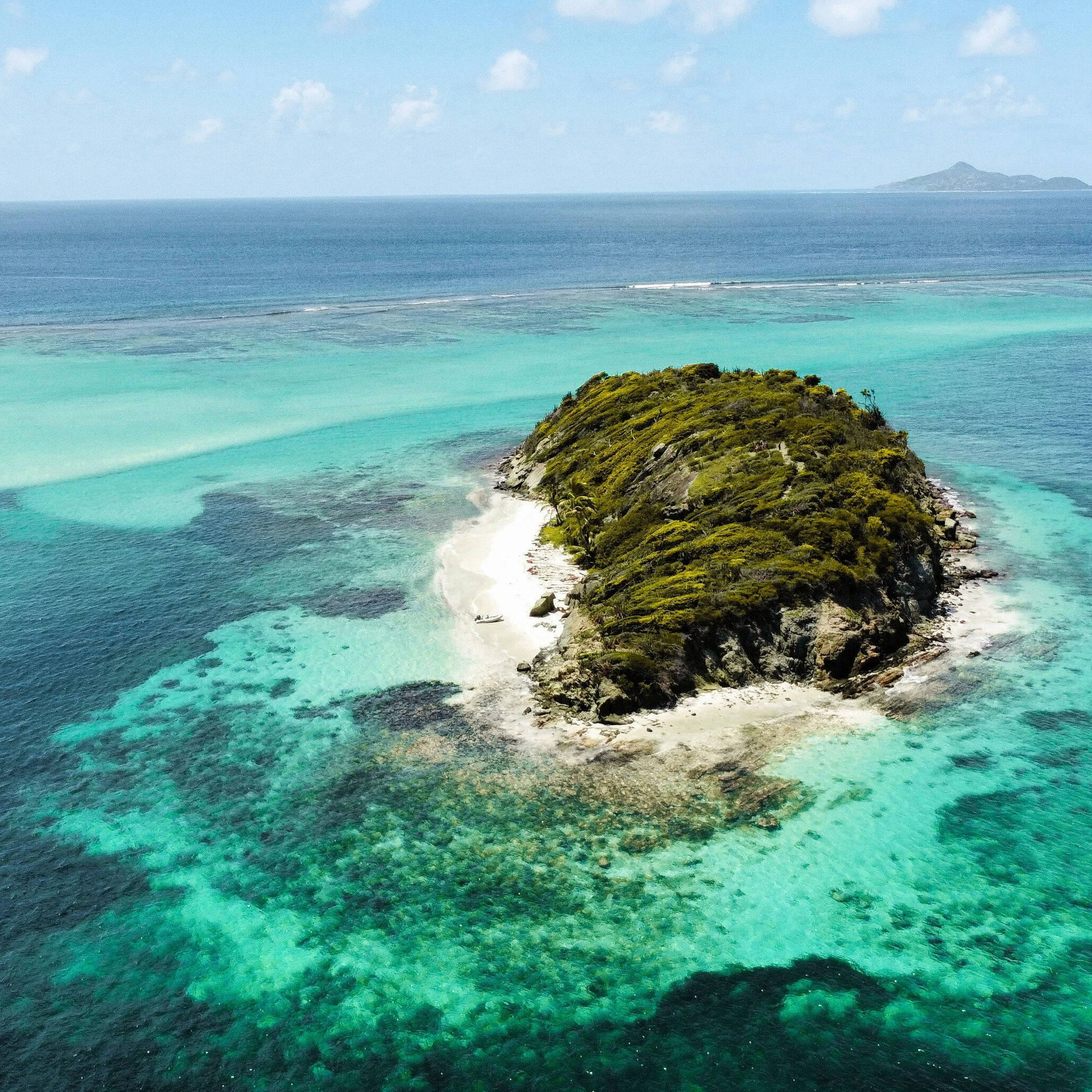 Tobbaco Cays ocean aerial view 